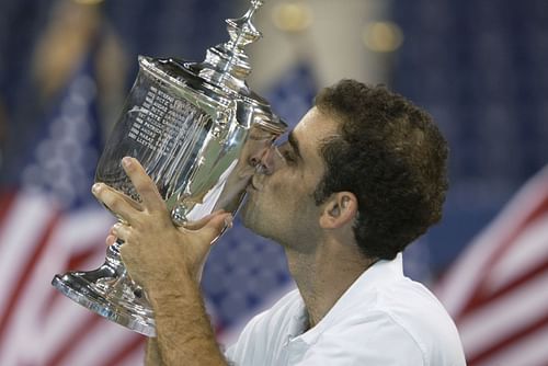 Pete Sampras pictured with his last Grand Slam title at US Open 2002