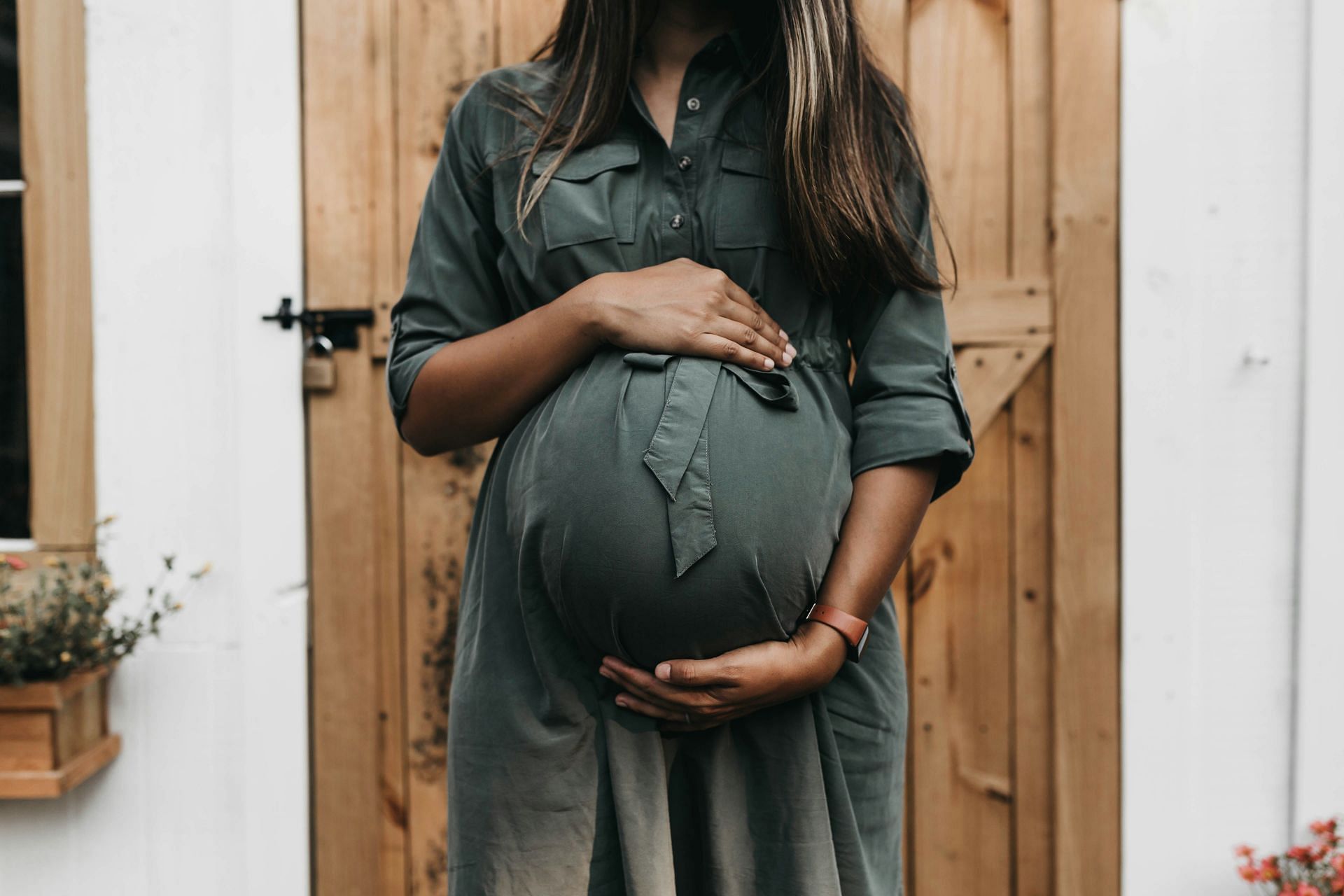 Are you hiding your pregnancy stretch marks? (Image by Camylla Battani/Unsplash)