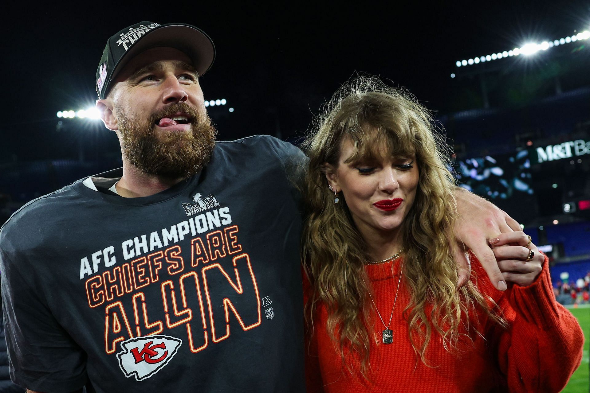 Taylor Swift and Travis Kelce in winning the AFC title.