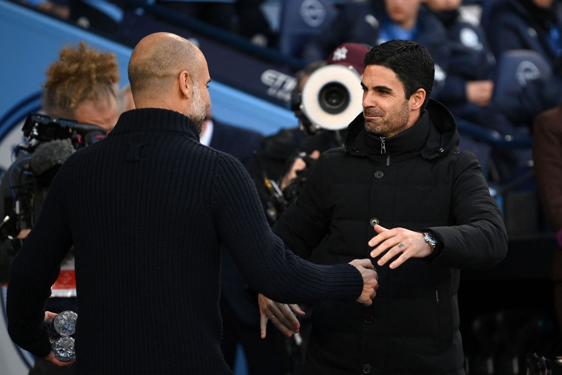 Pep Guardiola (left) moved to praise his title rivals.