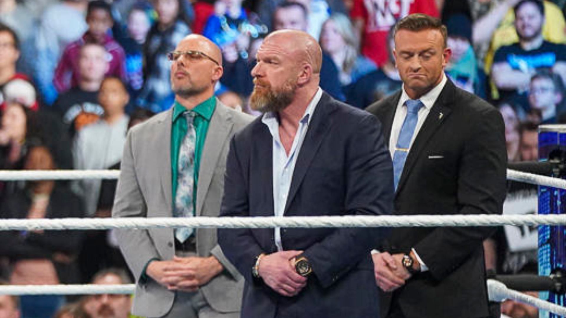 Triple H, Nick Aldis, and Adam Pearce on SmackDown.