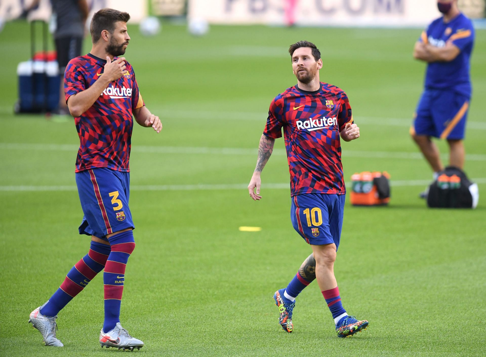 Gerard Pique and Lionel Messi for Barcelona