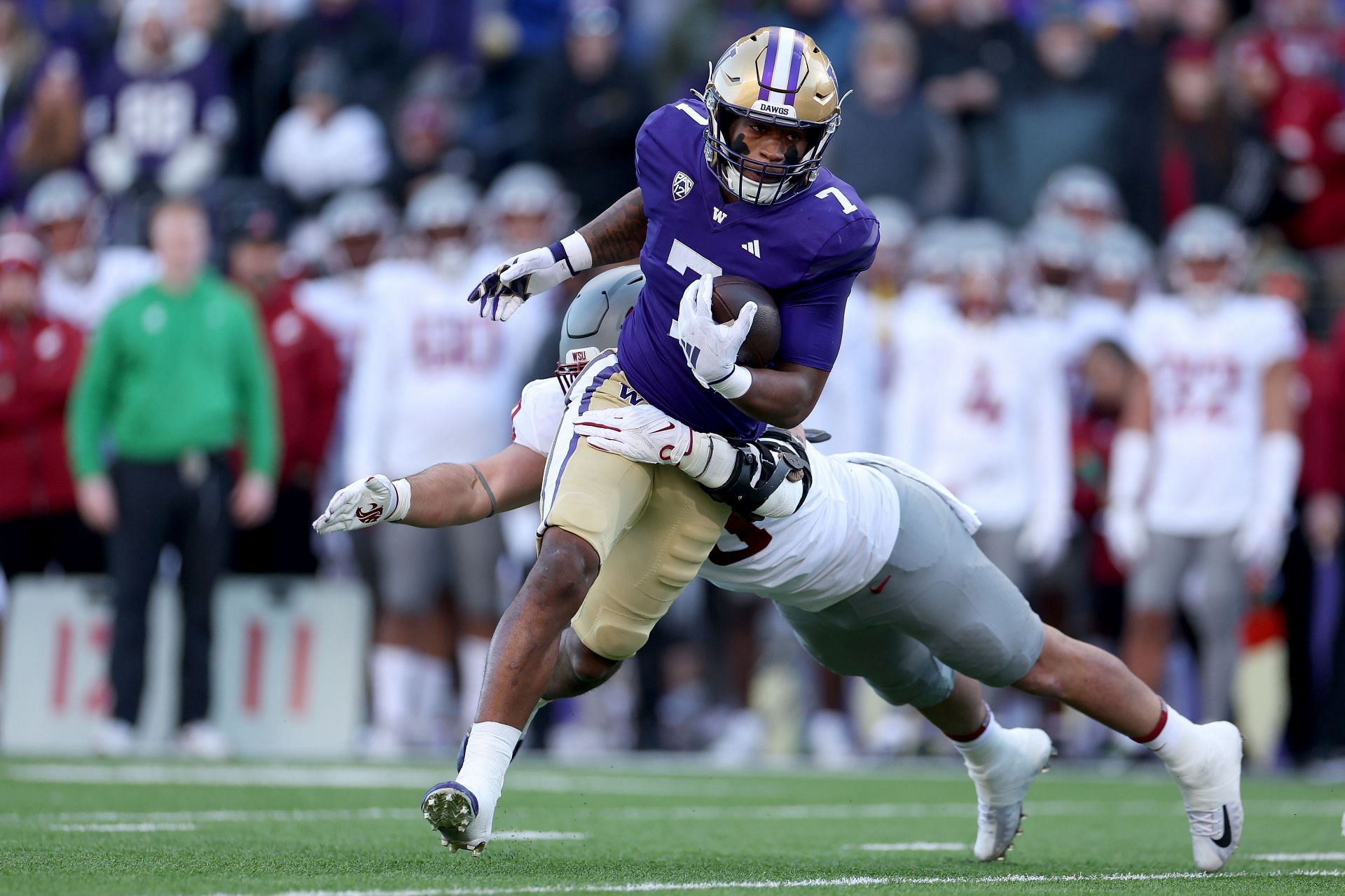 Washington running back Dillon Johnson is heading to the NFL Combine.