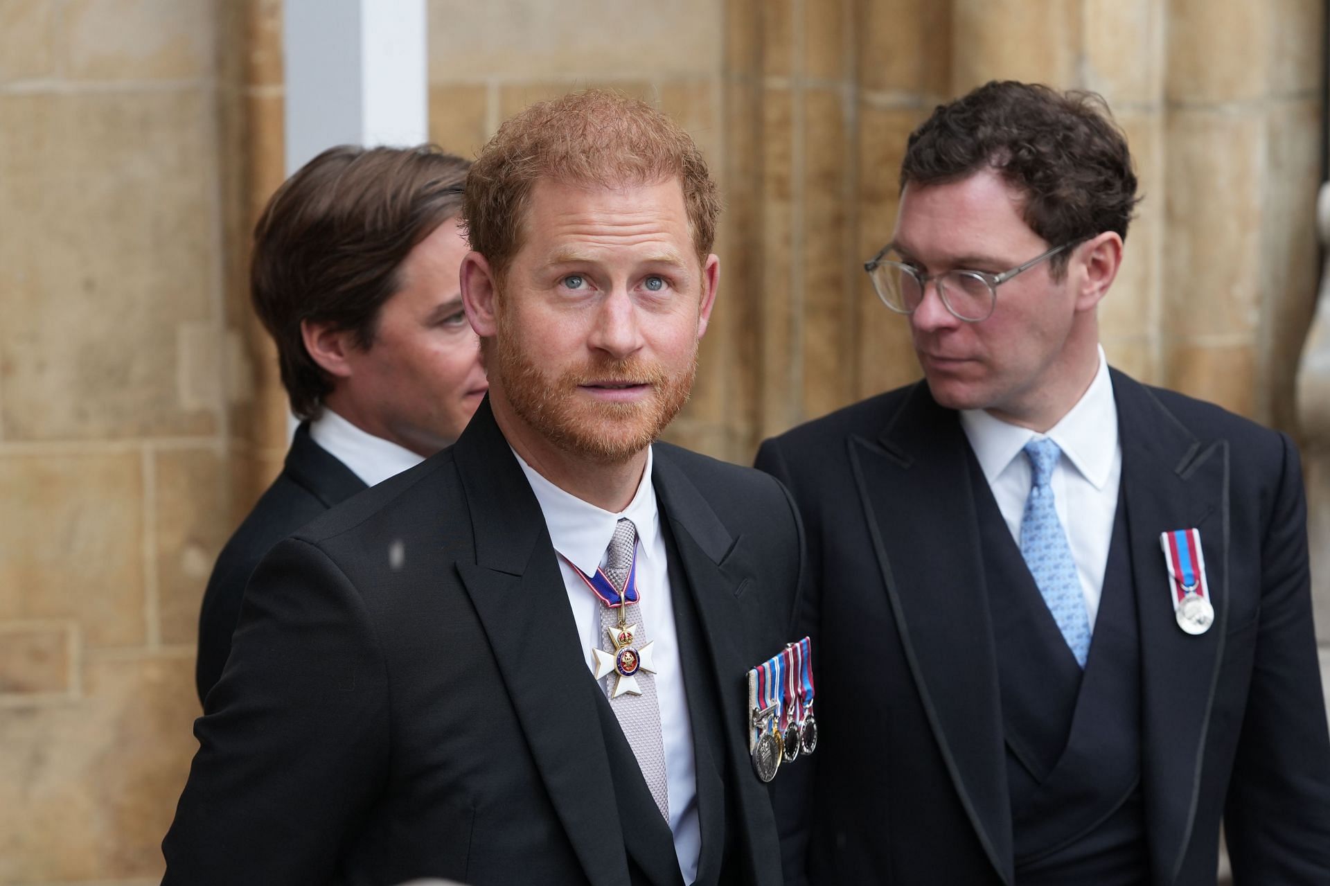  The Duke of Sussex leaves after the Coronation of King Charles III and Queen Camilla on May 6, 2023, in London, England. (Image via Getty)