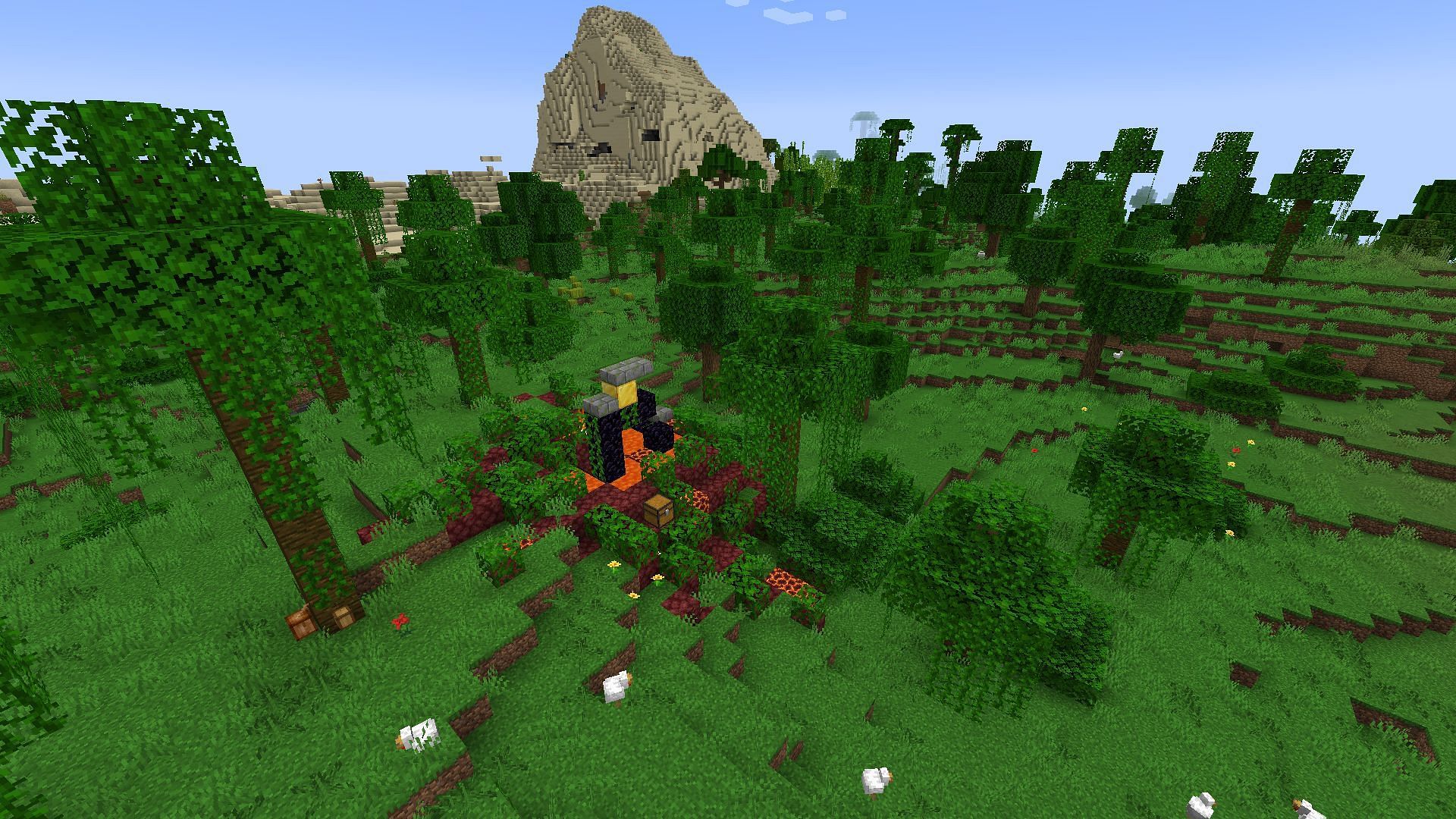 A ruined portal in a sparse jungle next to a desert village and temple (Image via Mojang)