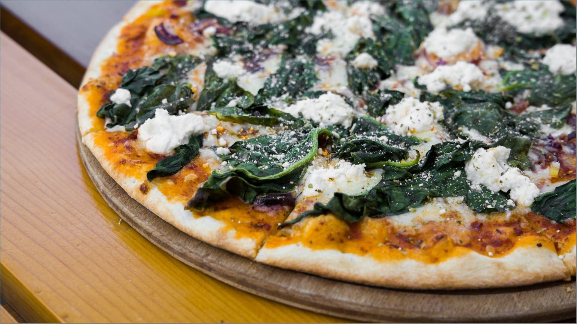 Mama Cozzi&#039;s Pizza Kitchen White Spinach Pizza is priced at $4.99 (Image via Engin Akyurt / Pexels)