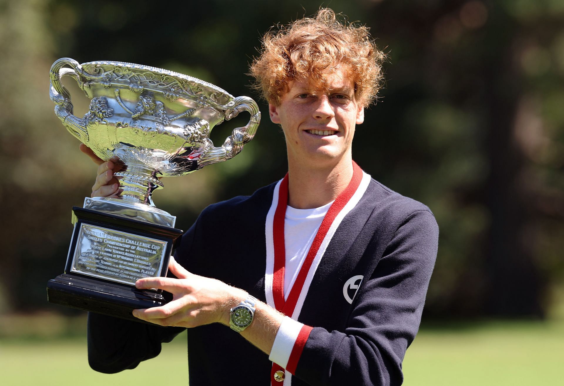 Jannik Sinner holds the Australian Open men&#039;s singles trophy.