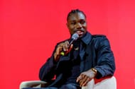 Noah Lyles on stage during the OMEGA panel discussion with Olympic ambassadors at The Planet OMEGA exhibition launch in New York City.