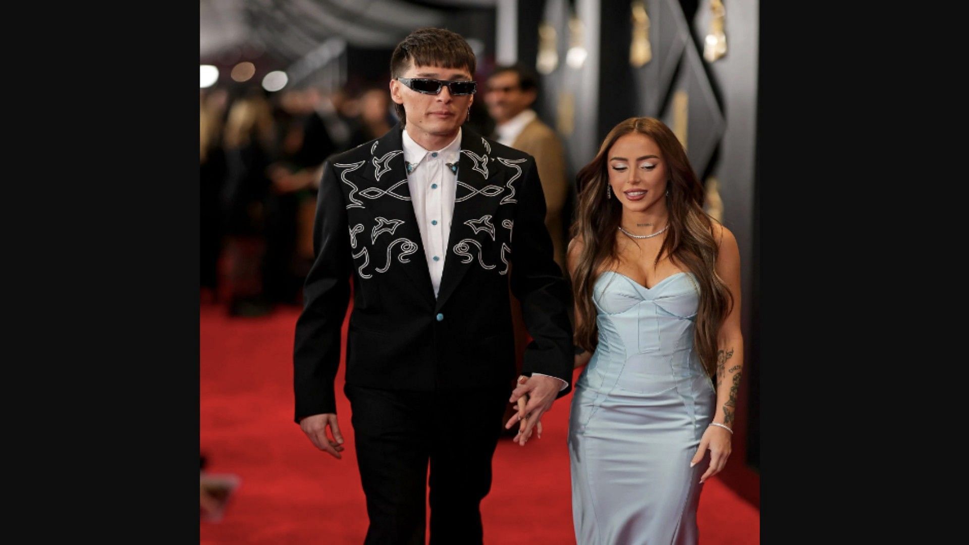 Peso Pluma and Nicki Nicole at 66th GRAMMY Awards - (Red Carpet Photo by Neilson Barnard/Getty Images for The Recording Academy)