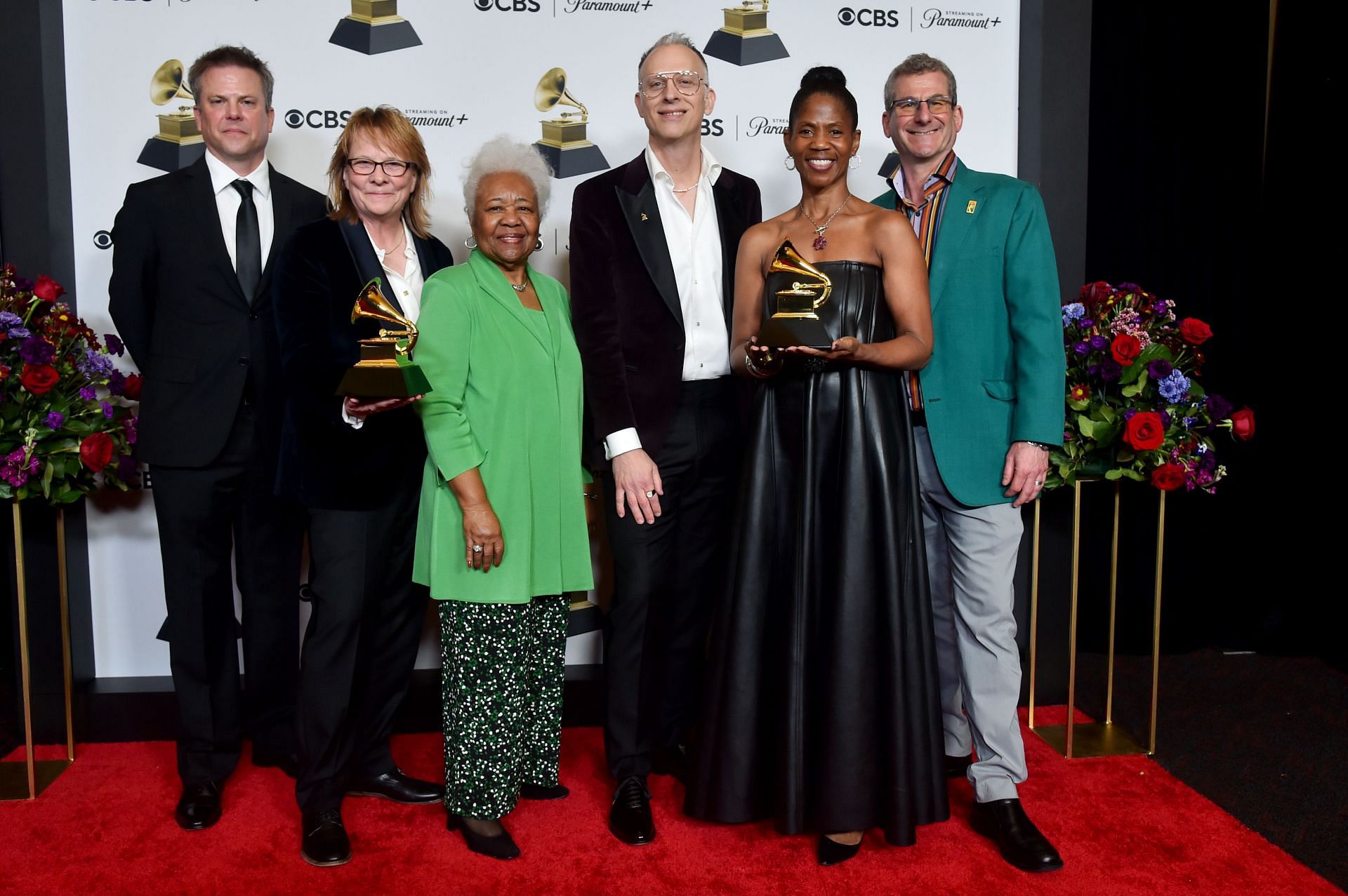 LOS ANGELES, CALIFORNIA - FEBRUARY 04: (L-R) Cheryl Pawelski, Deanie Parker, Michael Graves, Michele Smith and Robert Gordon, winners of the &quot;Best Historical Album&quot; award for &quot;Written In Their Soul: The Stax Songwriter Demos&quot;, and &quot;Best Album Notes&quot; award for &quot;Written In Their Soul: The Stax Songwriter Demos&quot;, pose in the press room during the 66th GRAMMY Awards (Photo by Alberto E. Rodriguez/Getty Images)