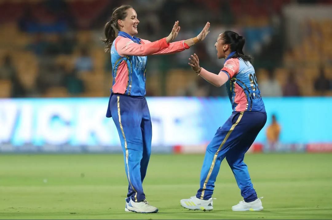 Amelia Kerr celebrating a wicket with Shabnim Ismail