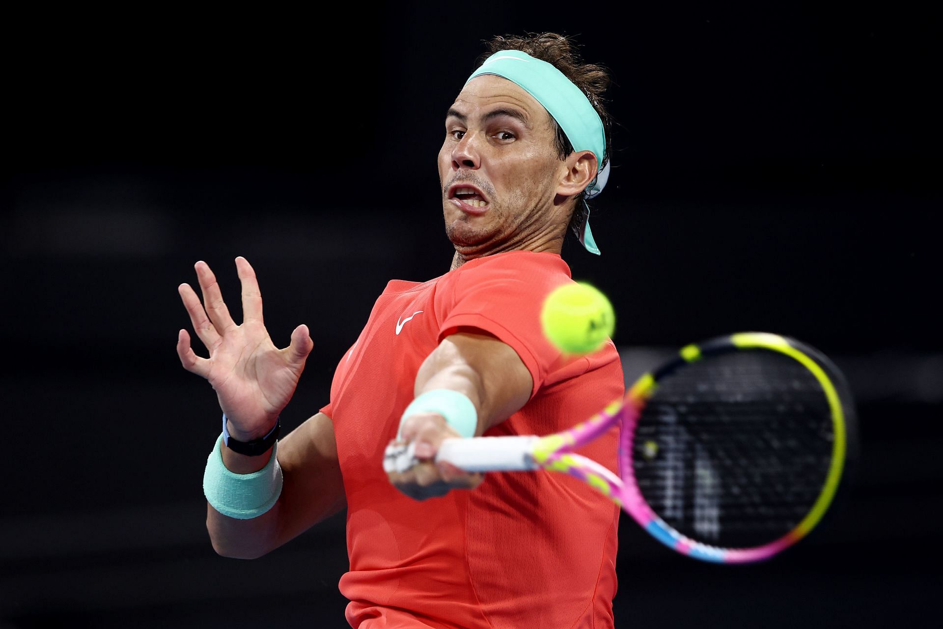 Rafael Nadal hits a forehand at the 2024 Brisbane International