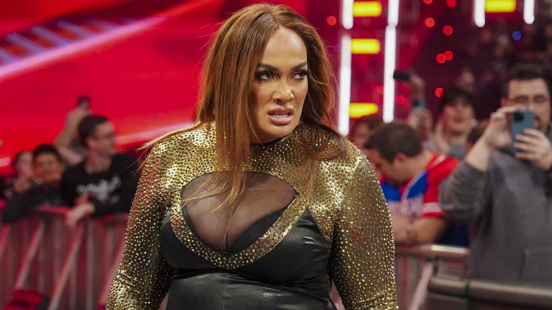 Nia Jax stands tall at ringside on WWE RAW