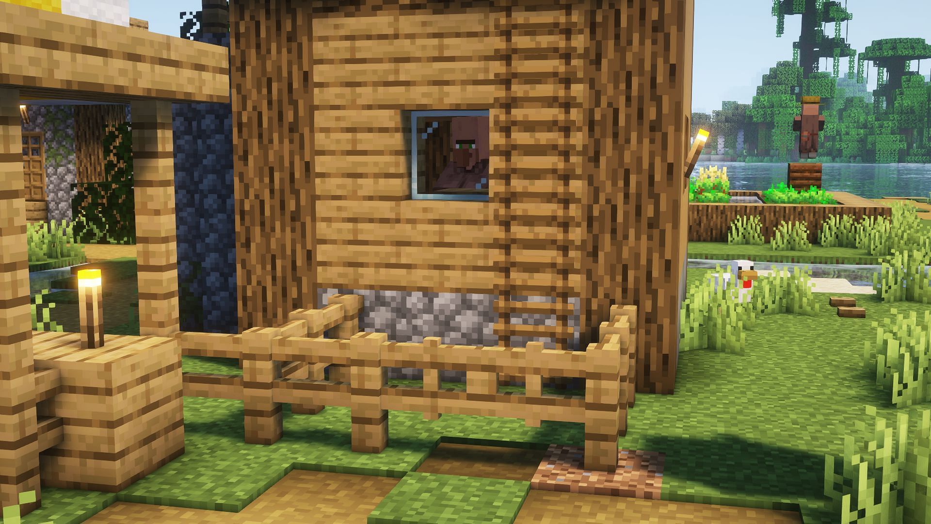 Using fences to prevent access to ladder (Image via Mojang)