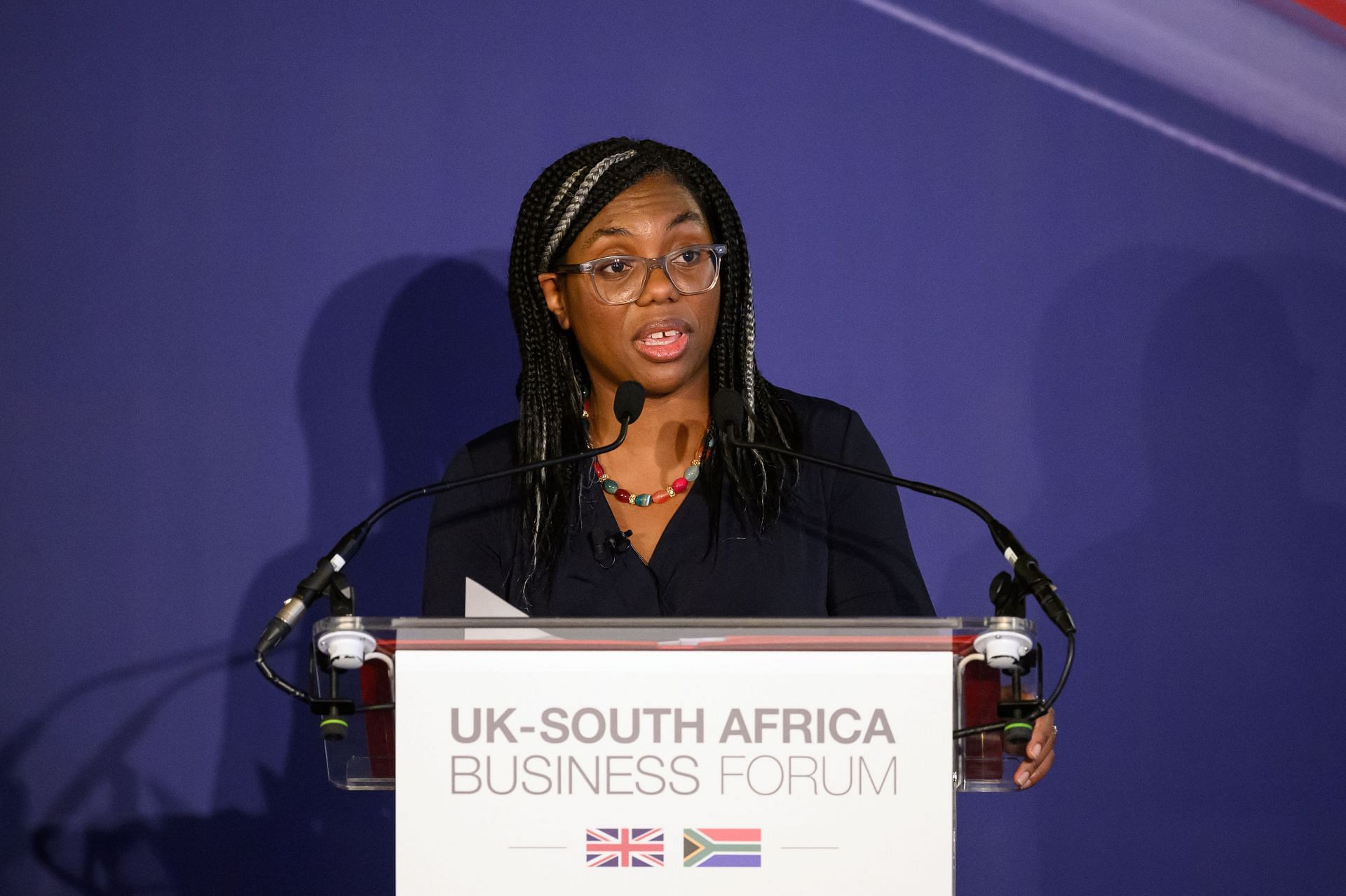 Kemi Badenoch speaking at the Business Forum at Lancaster House in 2022 in London (Image via Getty/Leon Neal)