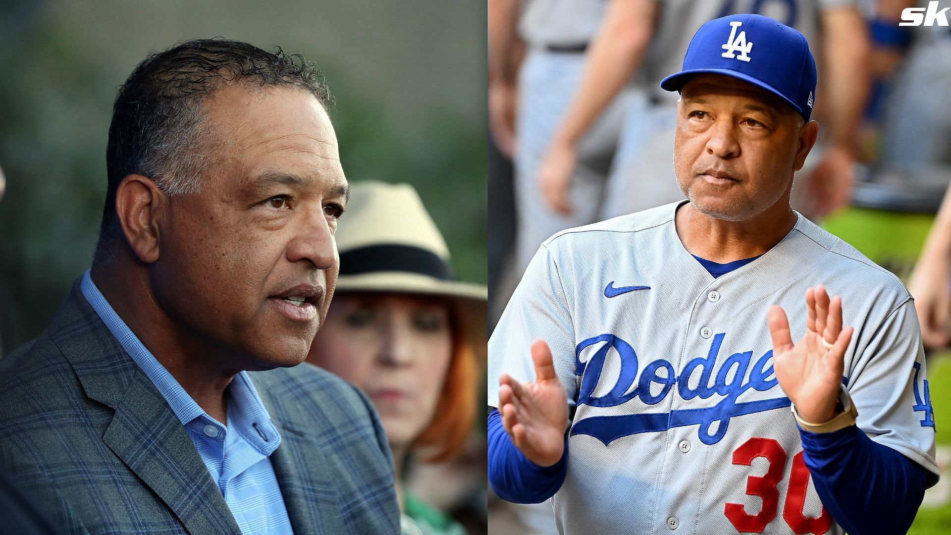 Manager Dave Roberts of the Los Angeles Dodgers looks on as Shohei Ohtani is introduced at Dodger Stadium