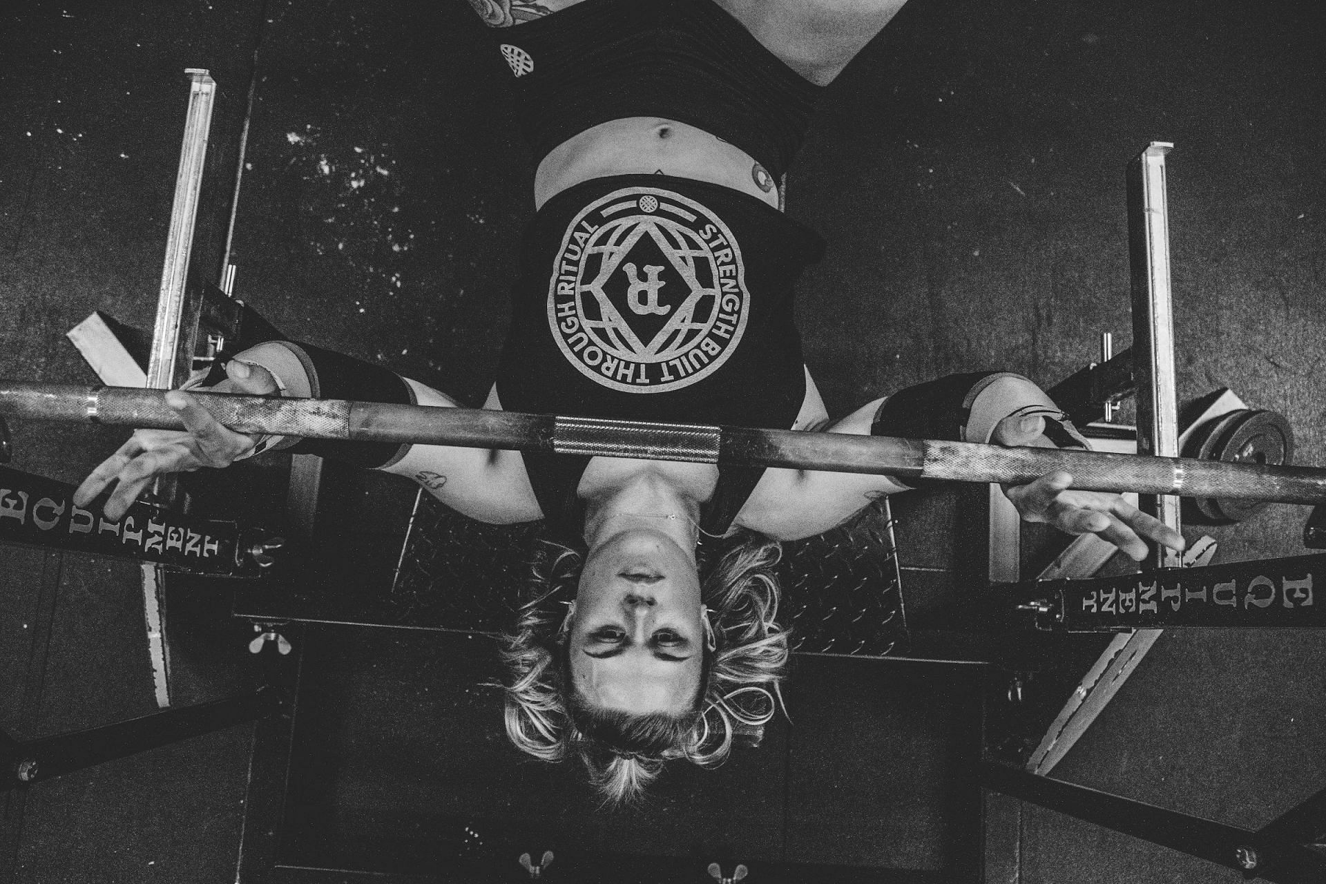 Suicide grip bench press (Image via Unsplash/Alora Griffiths)