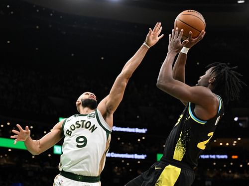 Boston Celtics guard Derrick White (left)