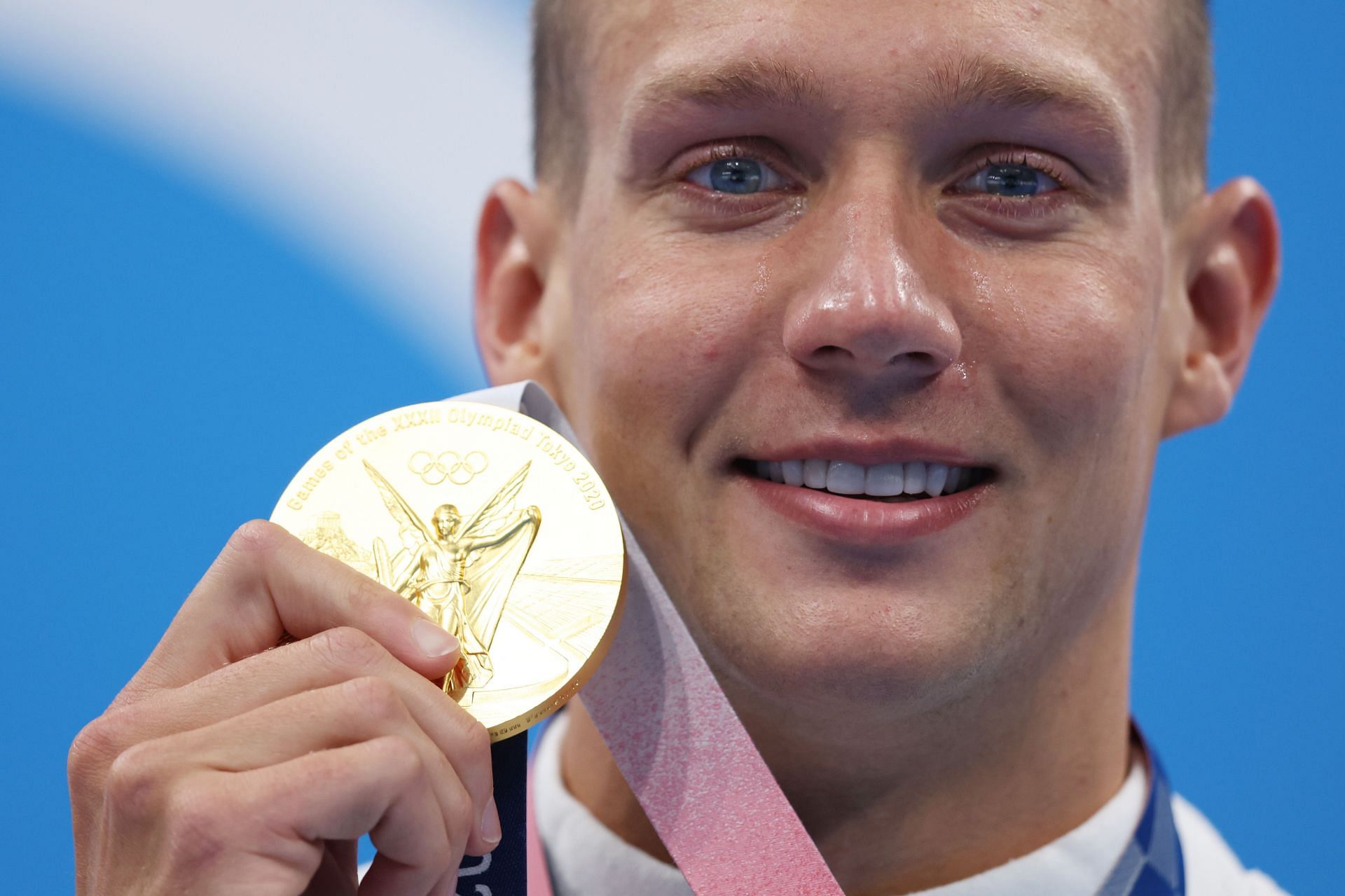 Caeleb Dressel poses with the gold medal for the Men&#039;s 100m Freestyle Final at the Tokyo 2020 Olympic Games. (Photo by Tom Pennington/Getty Images)