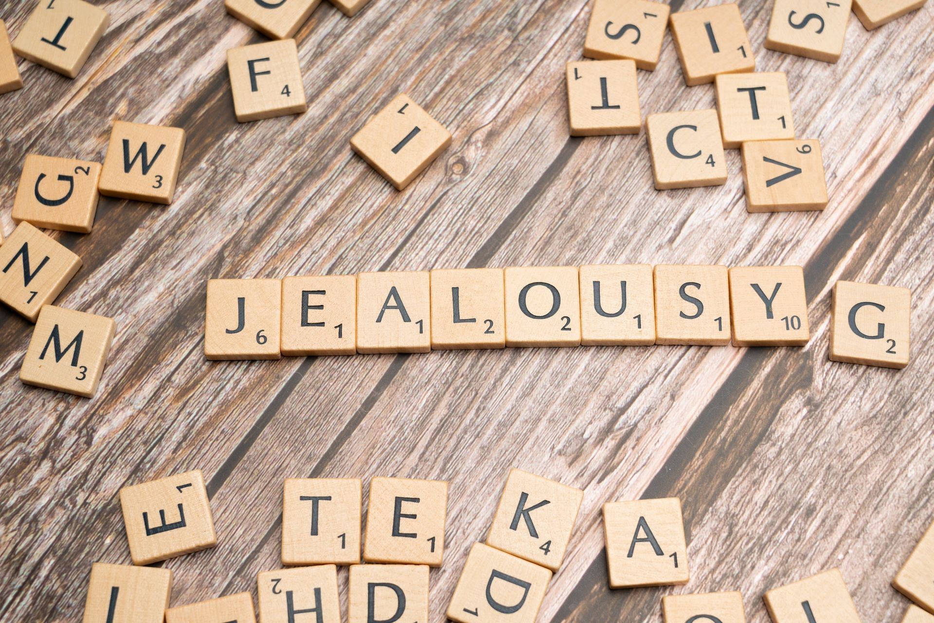 Jealousy can eat up relationship energy. (Image via Pexels/Markus Winkler)