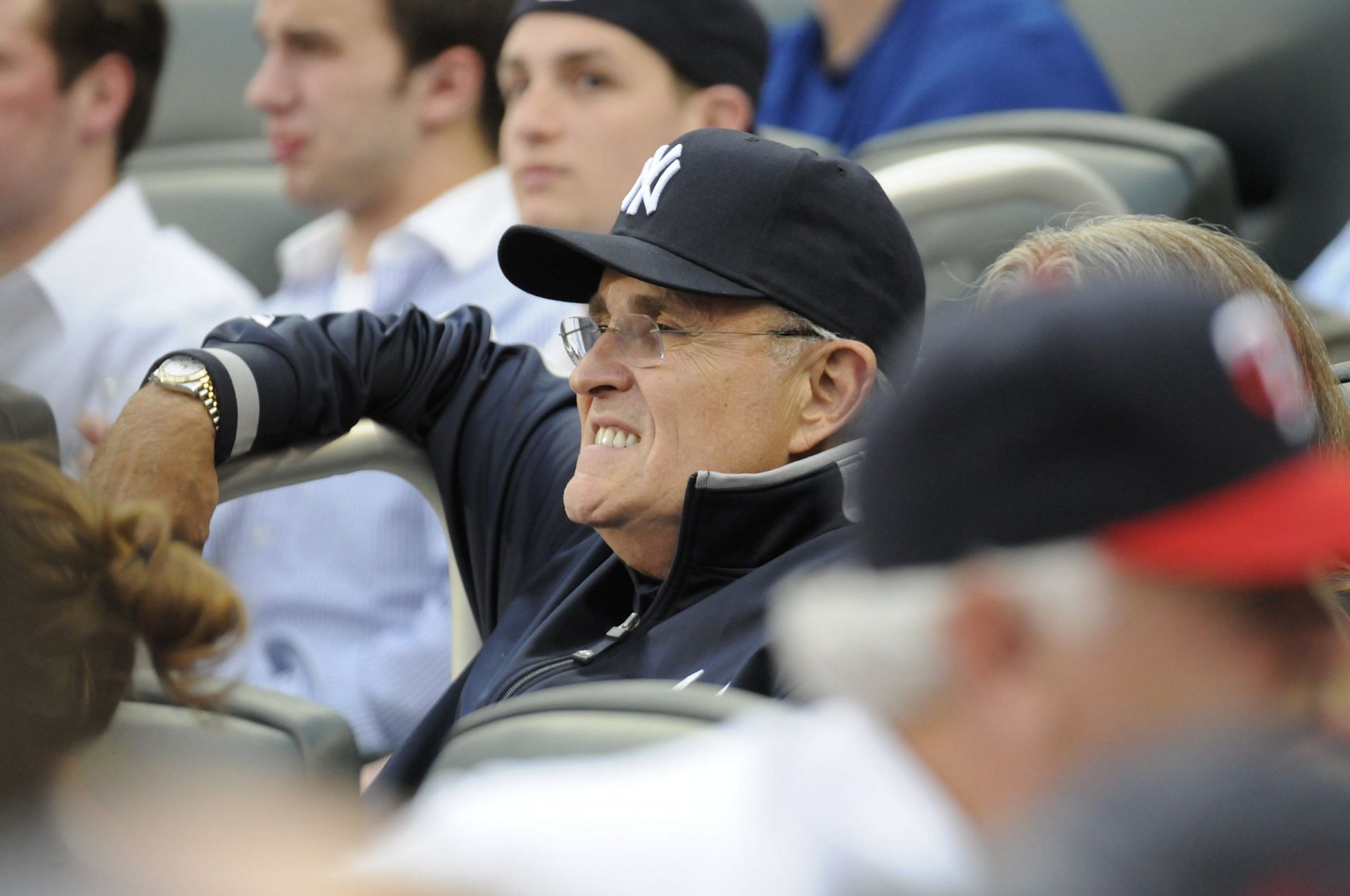 Former New York City Mayor Rudy Giuliani attended a New York Yankees event despite having announced a boycott of the team last summer.