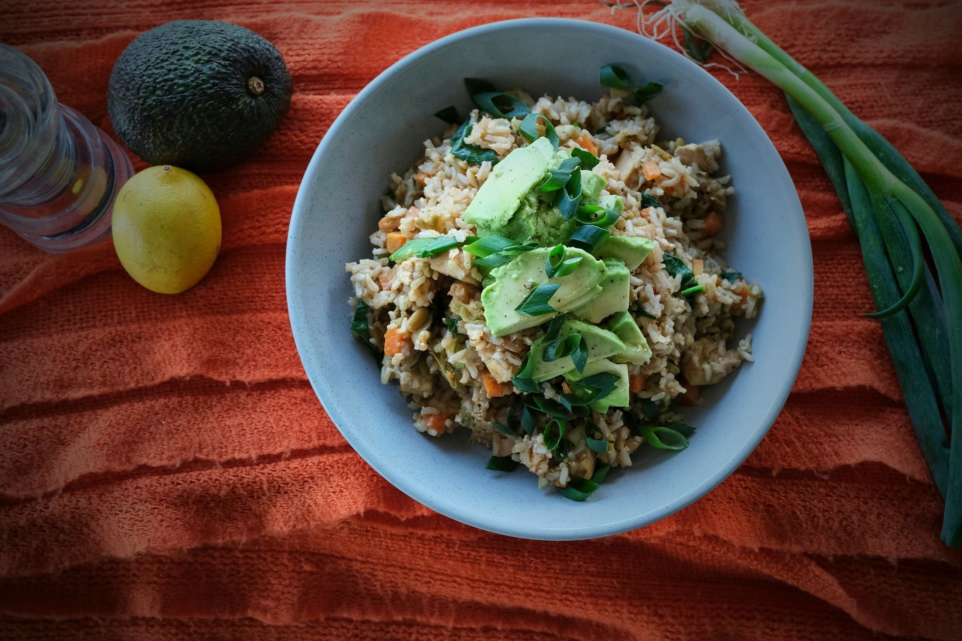 Brown rice with some tofu and avocado (Image by Rebecca Clarke/Unsplash)