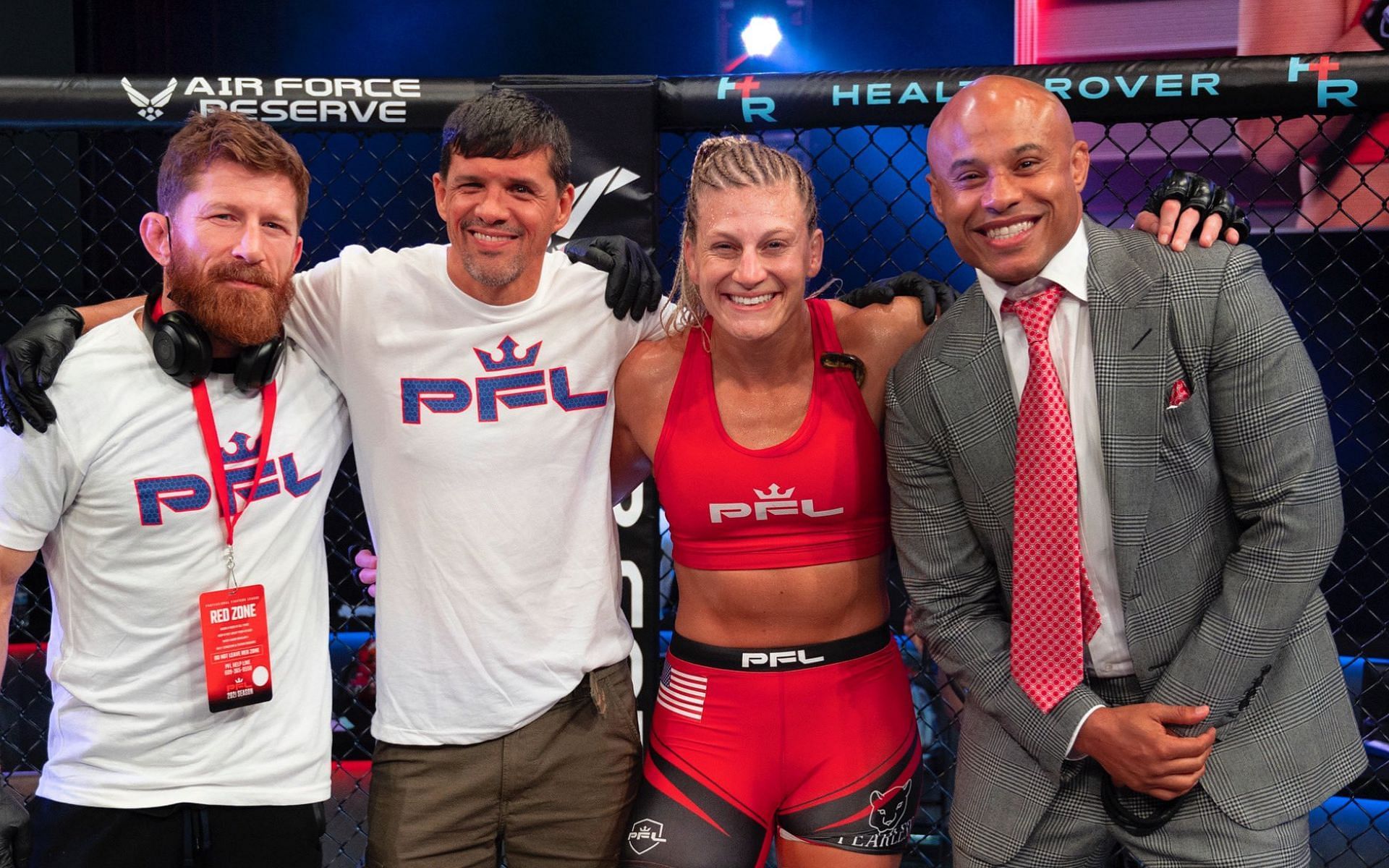 Kayla Harrison along with her team and manager Ali Abdelaziz