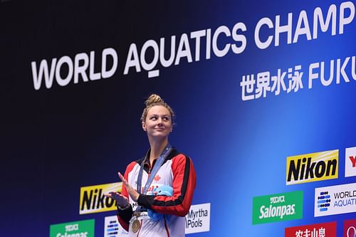 Summer Mcintosh of Team Canada poses during the medal ceremony for the Women's 400m Individual Medley Final on day eight of the Fukuoka 2023 World Aquatics Championships at Marine Messe Fukuoka Hall A on July 30, 2023 in Fukuoka, Japan. (Photo by Sarah Stier/Getty Images)