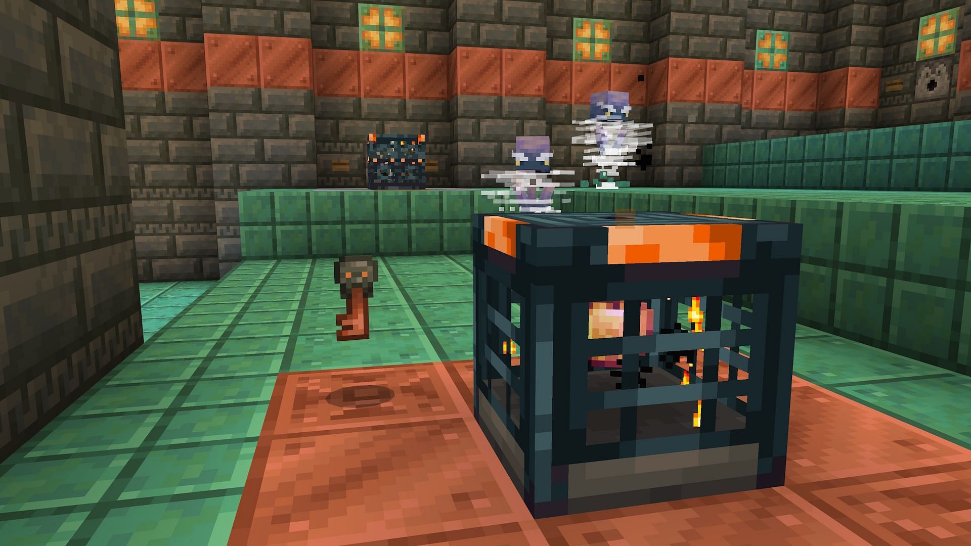 Minecraft&#039;s newly added Vault Block and its associated Key (Image via Mojang)