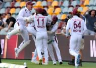 West Indies players mob Shamar after winning in Brisbane. (Credits: Getty)