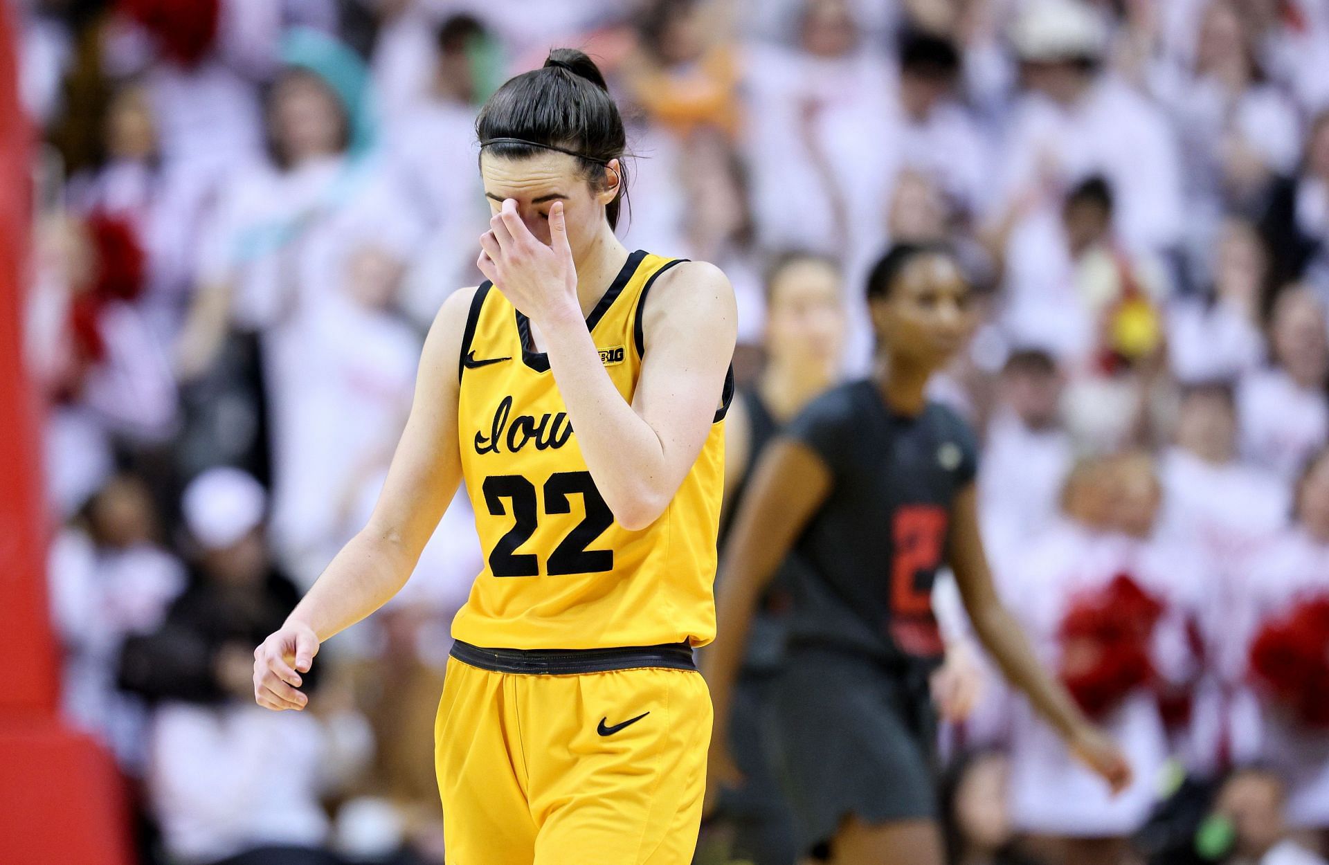 Caitlin Clark #22 of the Iowa Hawkeyes walks down the court after missing a shot in the second half of the 86-69 loss to the Indiana Hoosiers.