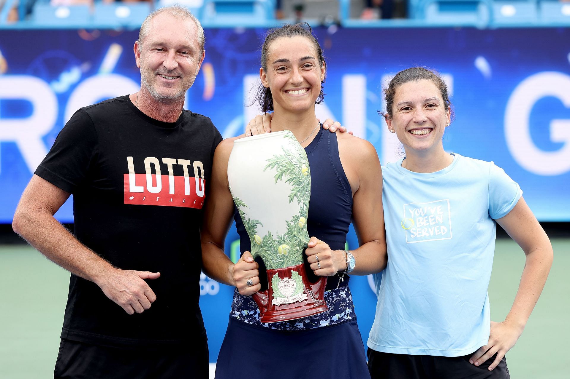 Caroline Garcia with coach Bertrand Perret and trainer Laura Legoupil at the 2022 Western &amp; Southern Open - Getty Images