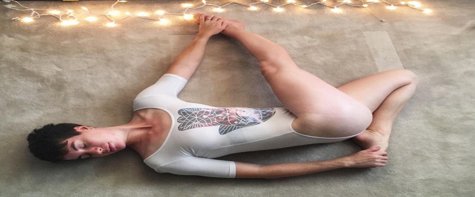 Recovery yoga poses: Reclined Twist (Image by clarissa_mae_/Instagram)