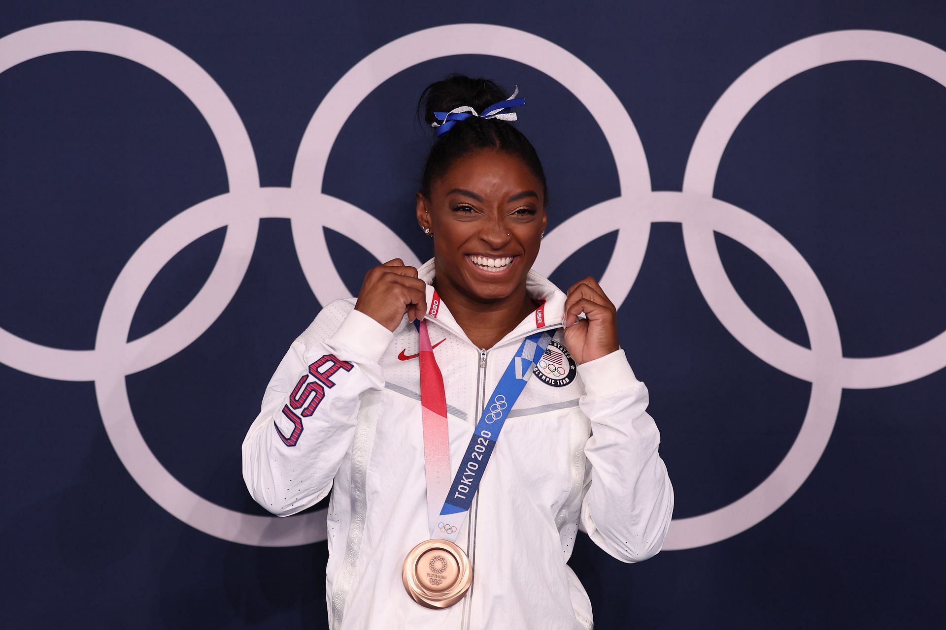 Simone Biles of Team United States poses with the bronze medal following the Women's Balance Beam Final on day eleven of the Tokyo 2020 Olympic Games at Ariake Gymnastics Centre in Tokyo, Japan.