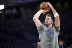 Watch: Air Jordan athlete Luka Doncic deftly hides Adidas logo on custom Real Madrid uniform arriving for Mavericks vs Suns game