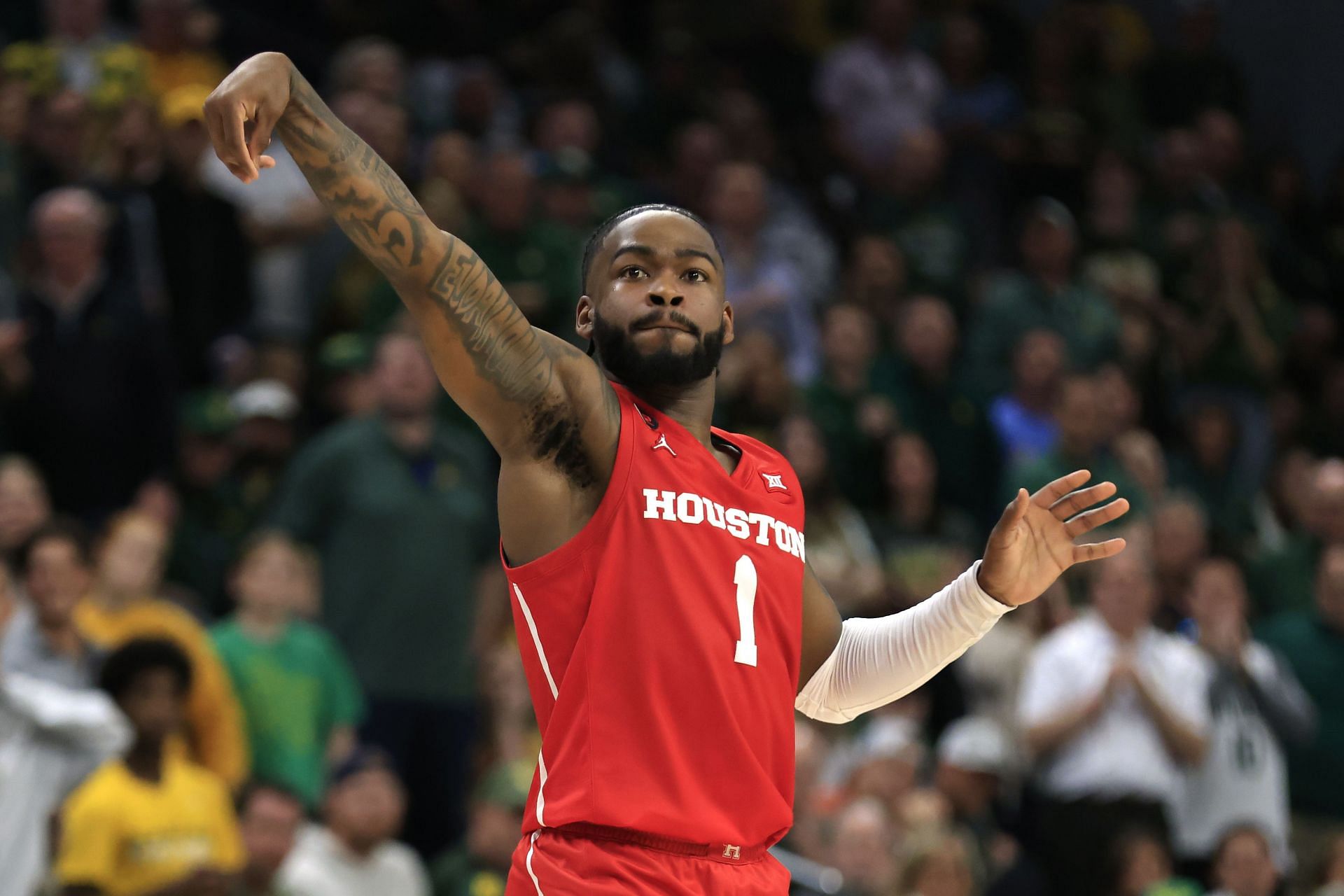 Houston Cougars&#039; Jamal Shead attempts a three-point shot against Baylor