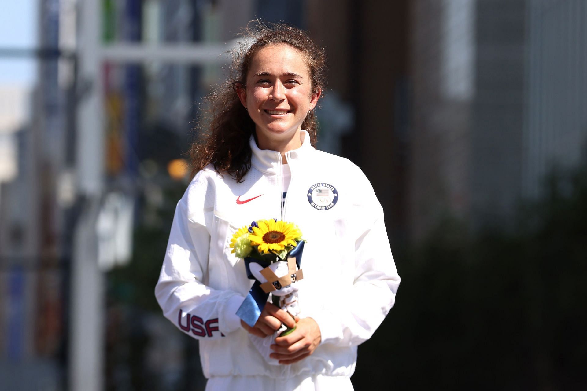 Molly Seidel poses for a photo during the flower ceremony for the Women&#039;s Marathon Final at the 2020 Olympic Games in Sapporo, Japan.