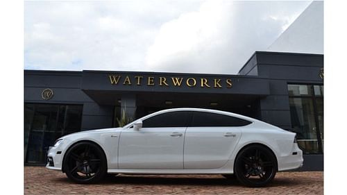 J.D. Martinez's white Audi A7 fitted with black rims by MC Customs. Credit: rides-mag.com