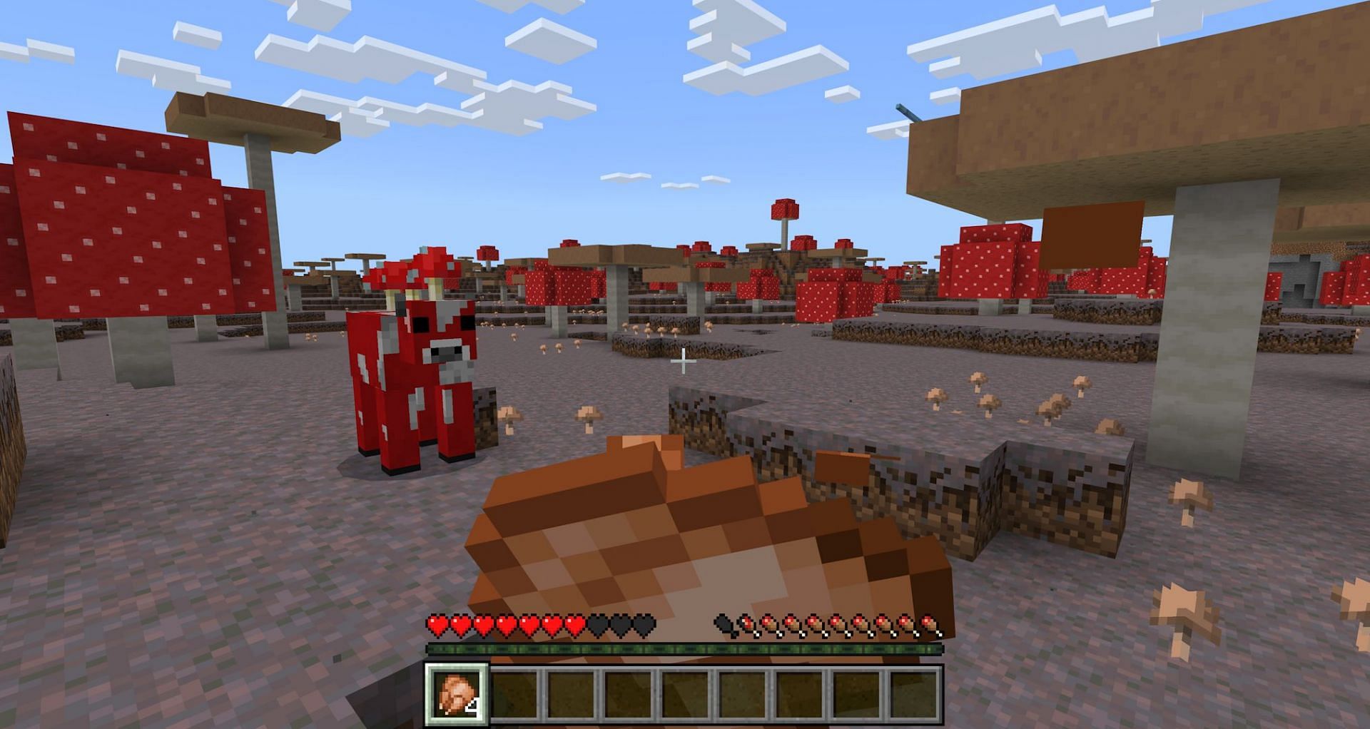 A player eating cooked chicken to regain hunger (Image via Mojang Studios)
