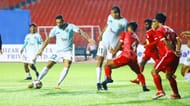 Sreenidi Deccan's Eli Sabia (left) takes a shot against Aizawl FC.