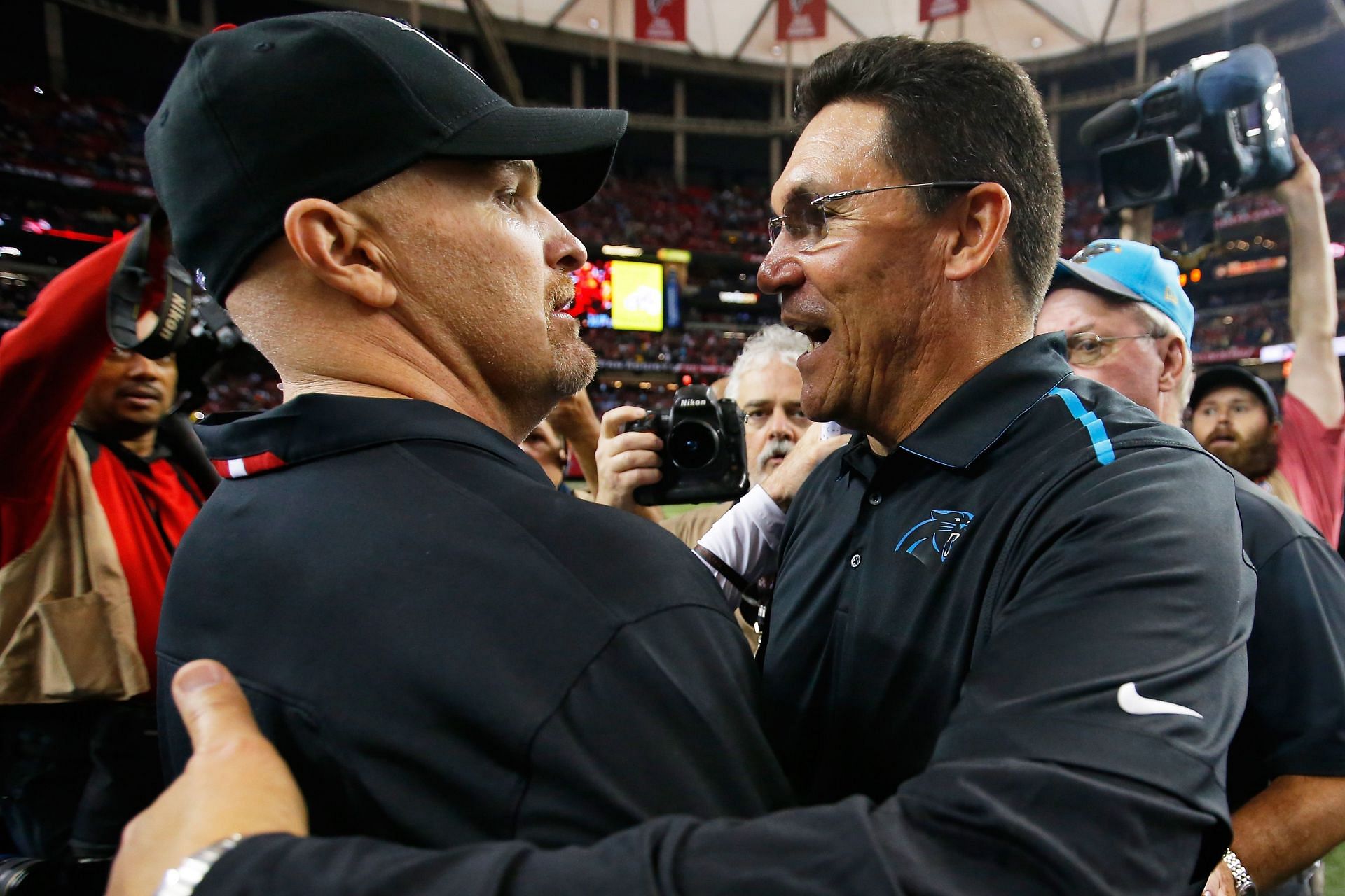 Dan Quinn and Ron Rivera