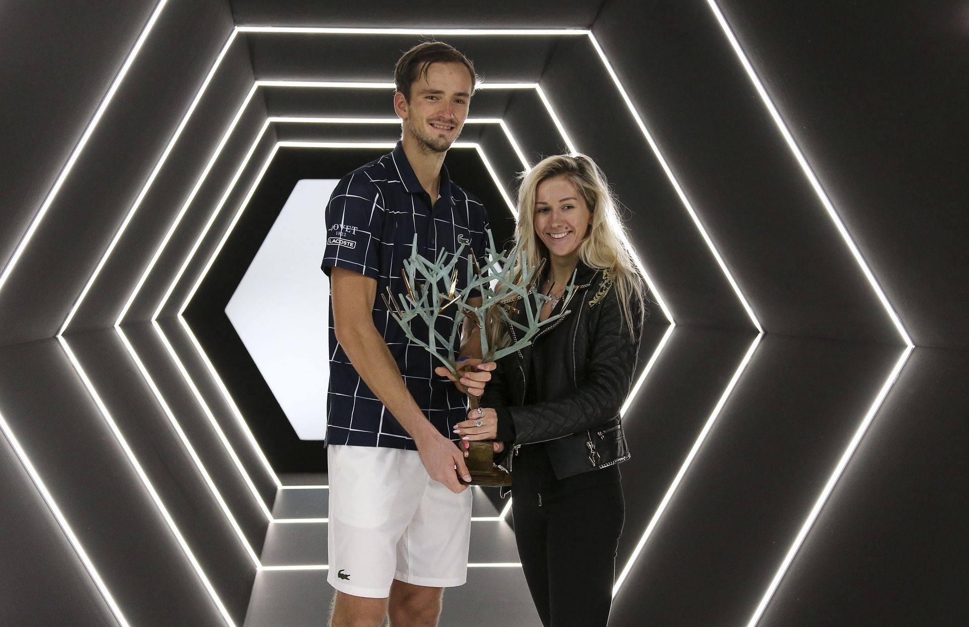 Daniil Medvedev and wife Daria pose with the 2020 Paris Masters winner&#039;s trophy