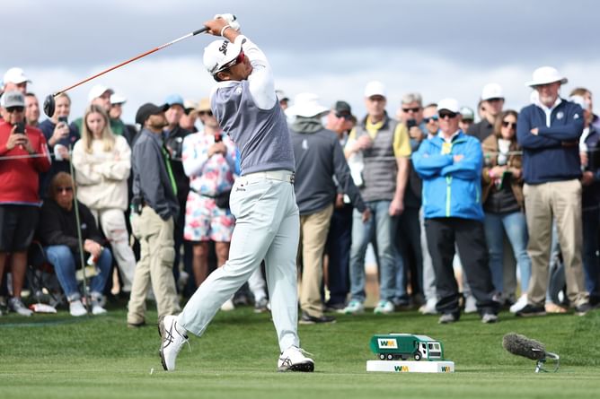Hideki Matsuyama rushes to the crowd after his drive hits a fan in the face at WM Phoenix Open