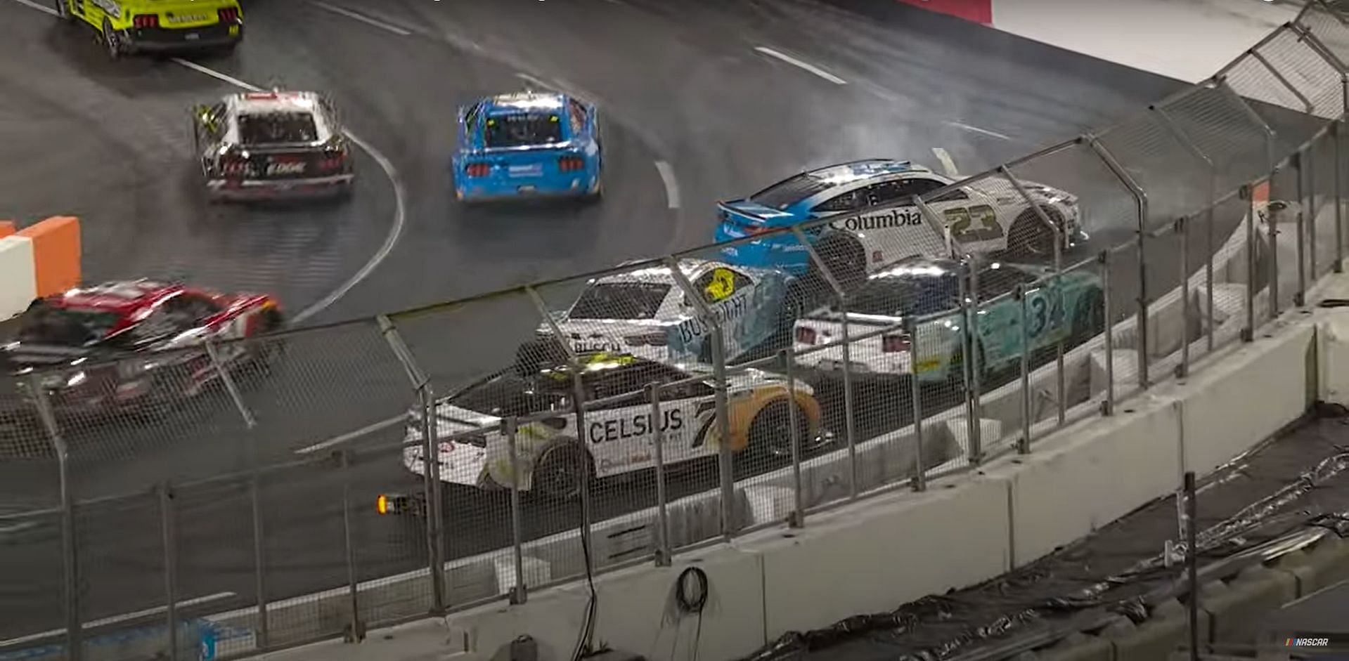 Bubba Wallace (#23) faces the wrong way after spinning during the 2024 NASCAR Busch Light Clash