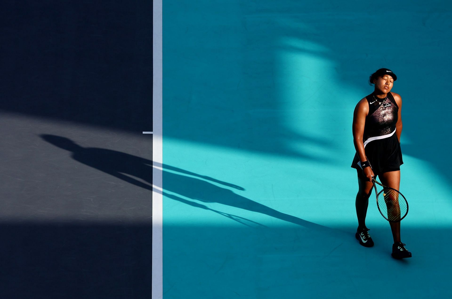 Naomi Osaka looks on at the 2024 Mubadala Abu Dhabi Open