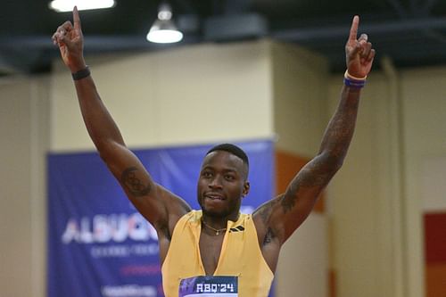 Grant Holloway celebrates after setting a world record in the first round of the Men's 60m Hurdles during the 2024 USATF Indoor Championships at the Albuquerque Convention Center in Albuquerque, New Mexico.