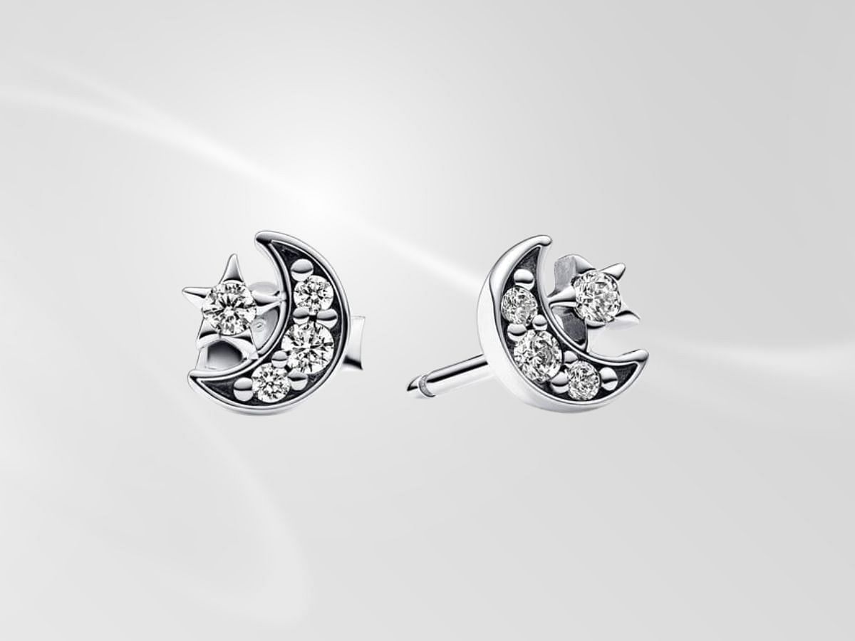 The Sparkling Moon and Star Stud Earrings (Image via Pandora)