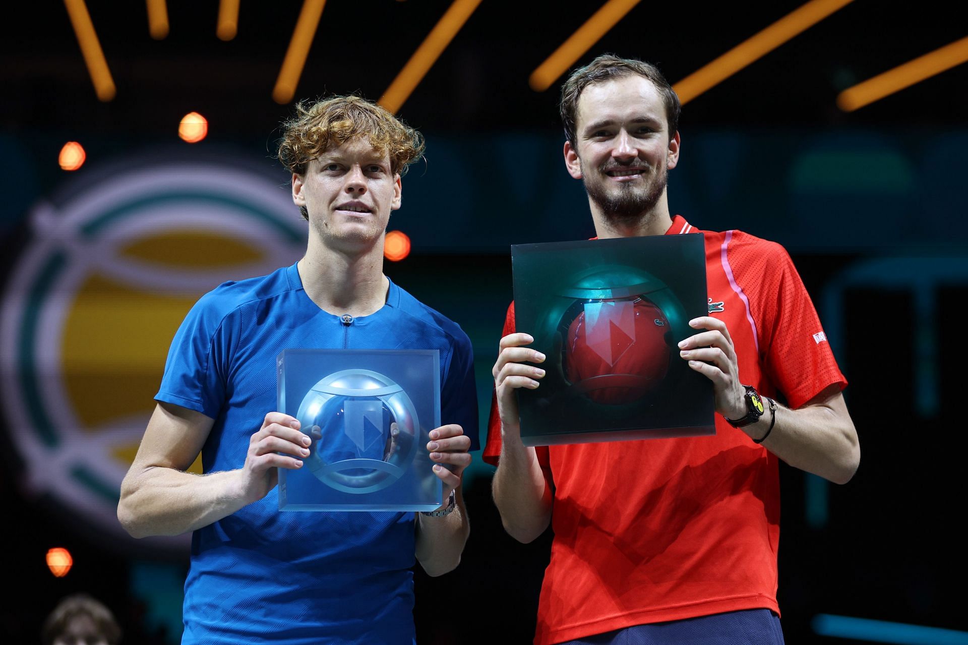 Daniil Medvedev (R) pictured with Jannik Sinner (L) at the 2023 ATP Rotterdam