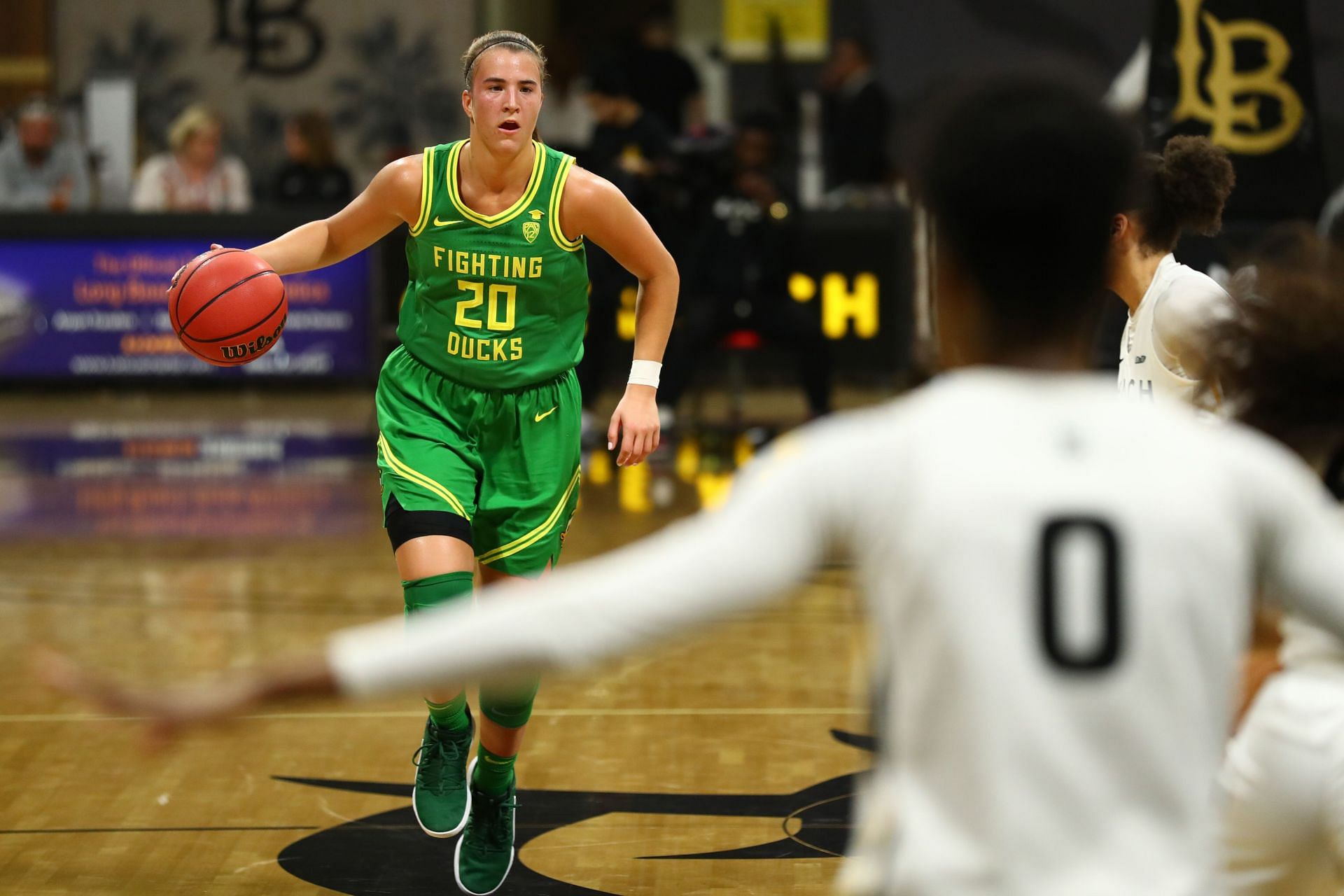 Sabrina Ionescu playing for the Oregon Ducks