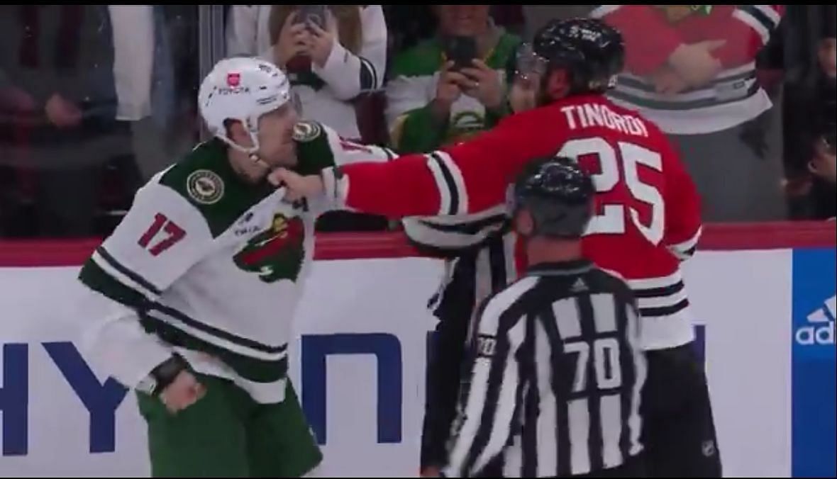 Jared Tinordi and Marcus Foligno exchange haymakers in spirited bout